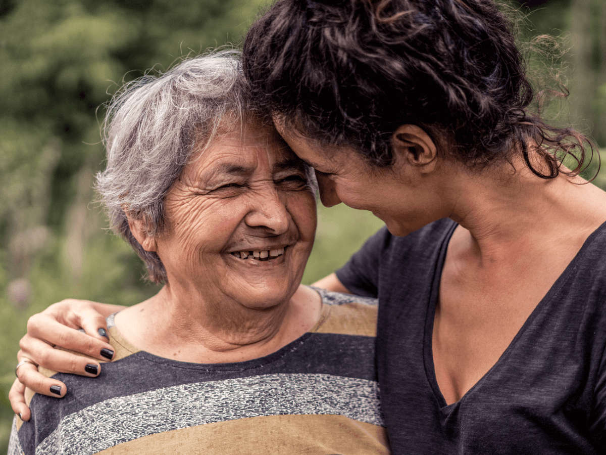 Woman-with-arm-around-elderly-mother